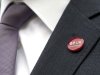 Britain's Chancellor of the Exchequer George Osborne wears a G7 badge as he arrives at the G7 Finance Ministers meeting in Aylesbury, southern England
