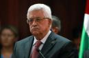 Palestinian president Mahmud Abbas listens during a press conference on August 24, 2013 in the West Bank city of Ramallah