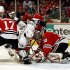 Chicago Blackhawks goalie Ray Emery (30) stops Los Angeles Kings' Justin Williams (14) in front of the goal in the first period of an NHL hockey game, Sunday, Feb. 17, 2013, in Chicago. (AP Photo/John Smierciak)