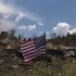An American flag waves in front of a house leveled by the Waldo Canyon fire in the Mountain Shadows community in Colorado Springs, Colorado