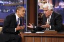 U.S. President Obama speaks to host Leno as he makes an appearance on the Tonight Show in Los Angeles
