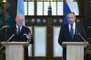 FILE - In this Wednesday, Nov. 4, 2015, file photo, Russian Foreign Minister Sergey Lavrov, right, listens as U.N. Special Envoy for Syria Staffan de Mistura speak during a news conference following their talks in Moscow. Russia has circulated a document, obtained by The Associated Press on Tuesday, Nov. 10, on ending the nearly five-year-old Syrian conflict that calls for drafting a new constitution in up to 18 months that would be put to a popular referendum and be followed by an early presidential election. (AP Photo/Alexander Zemlianichenko, File)