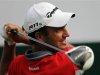 Molinari of Italy watches his shot on the first hole during the BMW Masters 2012 golf tournament at Lake Malaren Golf Club in Shanghai
