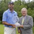 Matt Kuchar, left, accepts the trophy from Jack Nicklaus after winning the Memorial golf tournament Sunday, June 2, 2013, in Dublin, Ohio. (AP Photo/Jay LaPrete)