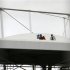 Men work on the roof of the Fonte Nova stadium after heavy rain in preparation for the 2013 Confederations Cup, in Salvador