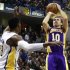Los Angeles Lakers' Nash shoots the basketball over Pacers' Mahinmi during the first half of an NBA basketball game in Indianapolis