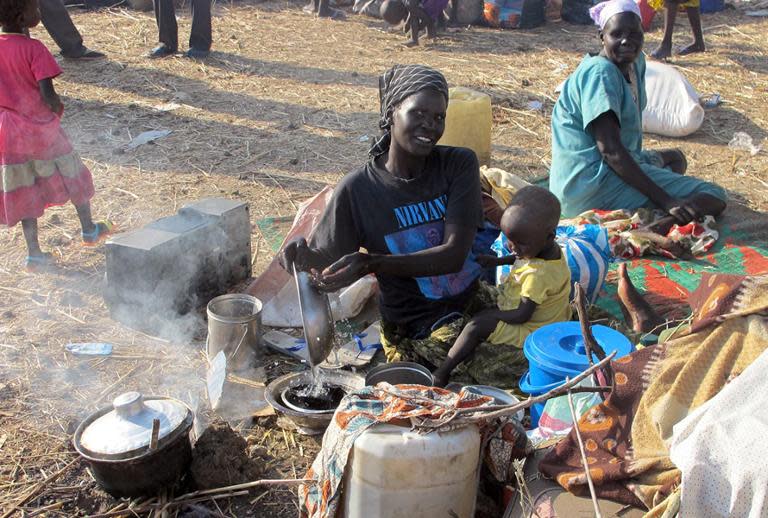 A handout photo released by UNMISS shows displaced people on December 22, 2033 in Bentiu, South Sudan