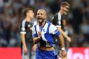 Porto's Andre Andre celebrates after scoring the opening goal during the Champions League group G soccer match between FC Porto and Chelsea FC at the Dragao stadium in Porto, Portugal, Tuesday, Sept. 29, 2015. (AP Photo/Steven Governo)