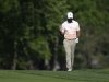 Tiger Woods walks to the 13th green during the second round of the Memorial golf tournament Friday, May 31, 2013, in Dublin, Ohio. (AP Photo/Darron Cummings)
