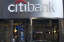 People exit a Citibank branch in New York