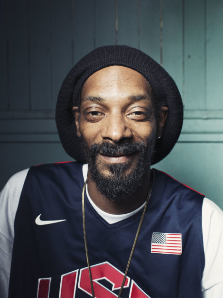 This Monday, July 30, 2012 photo shows Snoop Dogg, who now goes by Snoop Lion, posing for a portrait at Miss Lily's in New York. Snoop Dogg says he was “born again” during a visit to Jamaica in February, changed his name to Snoop Lion and is ready to make music that his “kids and grandparents can listen to.”  The artist known for gangster rap is releasing a reggae album called “Reincarnated” in the fall.  (Photo by Victoria Will/Invision/AP)