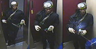 This Saturday, Dec. 17, 2011 surveillance photo provided by the New York Police Department shows a suspect wanted in connection with a homicide, in the Brooklyn borough of New York. A woman burned to death in the elevator of her Brooklyn apartment building Saturday afternoon after a man ambushed her, sprayed her with liquid and set her afire with a Molotov cocktail, police said. (AP Photo/New York Police Department)