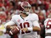 Alabama quarterback AJ McCarron passes during the first quarter of an NCAA college football game against Arkansas in Fayetteville, Ark., Saturday, Sept. 15, 2012. (AP Photo/Danny Johnston)