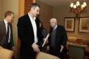 U.S. Senator McCain reacts as Ukrainian opposition leader Klitschko looks on during their meeting in Kiev