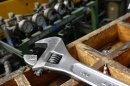 A wrench lies on a workbench at manufacturing firm Sigma UK in Hinckley