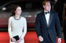 Britain's Prince William, Duke of Cambridge, and his wife Catherine, Duchess of Cambridge, arrive to attend the royal film premier of "Mandela: Long Walk to Freedom" in central London on December 5, 2013