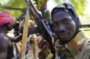 A South Sudan army soldier holds his weapon in Bor