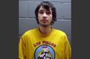 In this undated booking photo provided by the Cook County Sheriff's Office, Daniel Kowalski, a suburban Chicago man accused of operating a methamphetamine lab, wears a t-shirt for the fictional Los Pollos Hermanos chicken restaurant depicted in "Breaking Bad," a show about a methamphetamine manufacturer. Kowalski, 21, is charged with felony possession of a controlled substance, methamphetamine manufacturing materials and precursors. (AP Photo/Cook County Sheriff's Office)