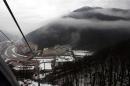 Rosa Khutor Alpine Resort pictured from the cable car cabin during heavy rain in Krasnaya Polyana near Sochi