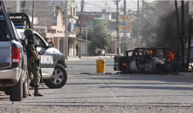 POLICIA - 30 muertos dejó enfrentamiento - Página 14 20120503-634716162566718851-jpg_001222