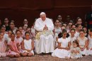 Pope Francis meets with children during an encounter with representatives of the civil society in the Municipal Theater in Rio de Janeiro