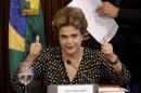 Brazil's President Dilma Rousseff gestures during a meeting with union members and businessmen in Brasilia