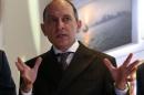 Qatar Airways Chief Executive Akbar Al Baker gestures as he tours the stand of company at the International Tourism Trade Fair in Berlin
