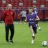 Poland's coach Smuda watches player Blaszcykowski during final practice session ahead of Euro 2012 in Warsaw