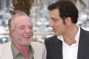 Actors James Caan and Clive Owen share a joke in Cannes