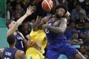 Australia's Andrew Bogut, center, United States' DeAndre Jordan (6) and United States' Klay Thompson (11) scramble for a rebound during a men's basketball game at the 2016 Summer Olympics in Rio de Janeiro, Brazil, Wednesday, Aug. 10, 2016. (AP Photo/Eric Gay)