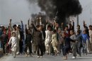 Afghan protesters shout slogans during a demonstration in Kabul