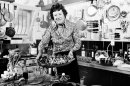 FILE- In this Aug. 21, 1978 file photo, chef Julia Child displays a salade nicoise she prepared in the kitchen of her vacation home in Grasse, southern France. A foundation set up by Julia Child is in a legal battle in August 2012 with the manufacturer of Thermador ovens, claiming BSH Home Appliances Corp., is using Child's name and image without permission in a marketing campaign of the company's high-end appliances. (AP Photo/File)