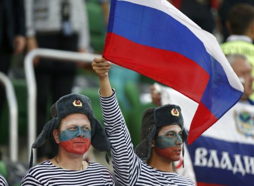 Russian fans cheer before the start of their Group A Euro 2012 soccer match against Czech Republic at the City Stadium in Wroclaw