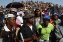 Striking miners evicted from company housing at a gold mine occupy a hill near the mine in Carltonville, west of Johannesburg