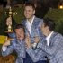 Europe's Martin Kaymer, Graeme McDowell and Justin Rose have some fun after winning the Ryder Cup PGA golf tournament Sunday, Sept. 30, 2012, at the Medinah Country Club in Medinah, Ill. (AP Photo/Chris Carlson)