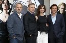 From L-R, director Mendes, actor Craig, actress Marlohe and Spanish actor Bardem pose for photographers during a photocall for the film "Skyfall" in Paris