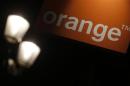 The logo of the Orange telecommunication and internet provider is seen on the facade of a store in Paris