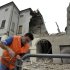 A volunteer ropes off the area surrounding a collapsed building in Finale Emilia, northern Italy after a quake hit northern Italy early Sunday, May 20, 2012. One of the strongest earthquakes to shake northern Italy rattled the region around Bologna early Sunday, a magnitude-6.0 temblor that killed at least four people, toppled buildings and sent residents running into the streets, emergency services and news reports said. (AP Photo/Marco Vasini)