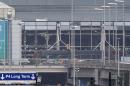 This file photo taken on March 22, 2016 shows the damaged facade of Brussels airport in Zaventem after at least 13 people were killed and 35 injured as twin blasts rocked the main terminal of Brussels airport
