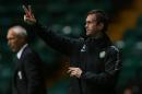 Celtic's manager Ronny Deila gestures from the touchline during a football match at Celtic Park in Glasgow on October 23, 2014