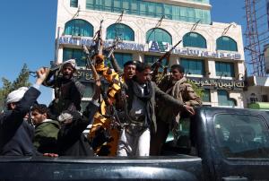 Shiite Huthi fighters shout slogans as they drive in&nbsp;&hellip;