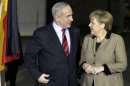 German Chancellor Angela Merkel, right, welcomes the Prime Minister of Israel, Benjamin Netanjahu, in front of the chancellery in Berlin, Germany, Wednesday, Dec. 5, 2012 for a joint dinner prior to intergovernmental talks on Thursday. (AP Photo/Michael Sohn, pool)