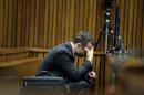 Olympic and Paralympic track star Oscar Pistorius reacts during a testimony at the North Gauteng High Court in Pretoria