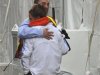 Members of the Boston Marathon medical team embrace after treating victims of explosions in Boston
