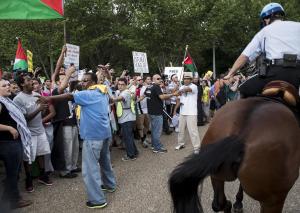 Protesters hold others back as US Park Police use horses &hellip;