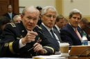 U.S. General Martin Dempsey, Chuck Hagel and John Kerry testify at a U.S. House Foreign Affairs Committee hearing on Syria on Capitol Hill in Washington