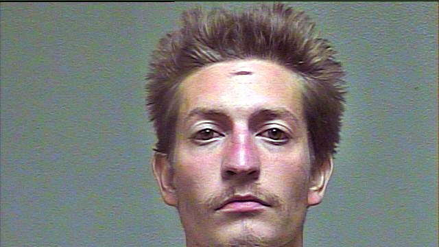 This undated photo provided by the Oklahoma County Sheriff&#39;s Office shows Christian Costello. Costello is accused of having stabbed his father, Oklahoma&#39;s labor commissioner Mark Costello to death Sunday evening, Aug. 23, 2015, at a fast-food restaurant in Oklahoma City. (Oklahoma County Sheriff&#39;s Office via AP)