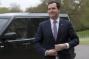 Britain's Chancellor of the Exchequer George Osborne arrives at the G7 finance ministers and central bank governors meeting in Aylesbury, England, Friday, May 10, 2013. The role of central banks in shoring up the global economic recovery is set to be a key point of discussion among top financial officials from the world's seven leading economies when they gather in the UK this weekend. In a statement Friday ahead of the Group of Seven's two-day meeting at a country house around 50 miles (80 kilometers) northwest of London, British finance minister George Osborne said the main task officials face over the coming two days is looking at how to "nurture" the recovery. (AP Photo/Alastair Grant, Pool)