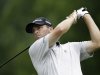 Ryan Palmer watches his tee shot on the fourth hole during the first round of the Colonial golf tournament, Thursday, May 23, 2013, in Forth Worth, Texas.  (AP Photo/LM Otero)