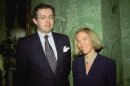 This photo of Nov. 26, 1996 shows Eva Rausing, right, and her husband Hans Kristian Rausing at Winfield House, London, the residence of the US ambassador to the UK attending the Glamour America Fashion Show and lunch. One of Britain's richest women, American-born Eva Rausing, was found dead in her west London home and a man was arrested in connection with the case, British police say, adding that an autopsy had failed to uncover a formal cause of death. Rausing, 48, was the wife of Hans Kristian Rausing, heir to the TetraPak fortune his father built by creating a successful manufacturer of laminated cardboard drink containers. (AP Photo/Alan Davidson/The Picture Library Ltd)